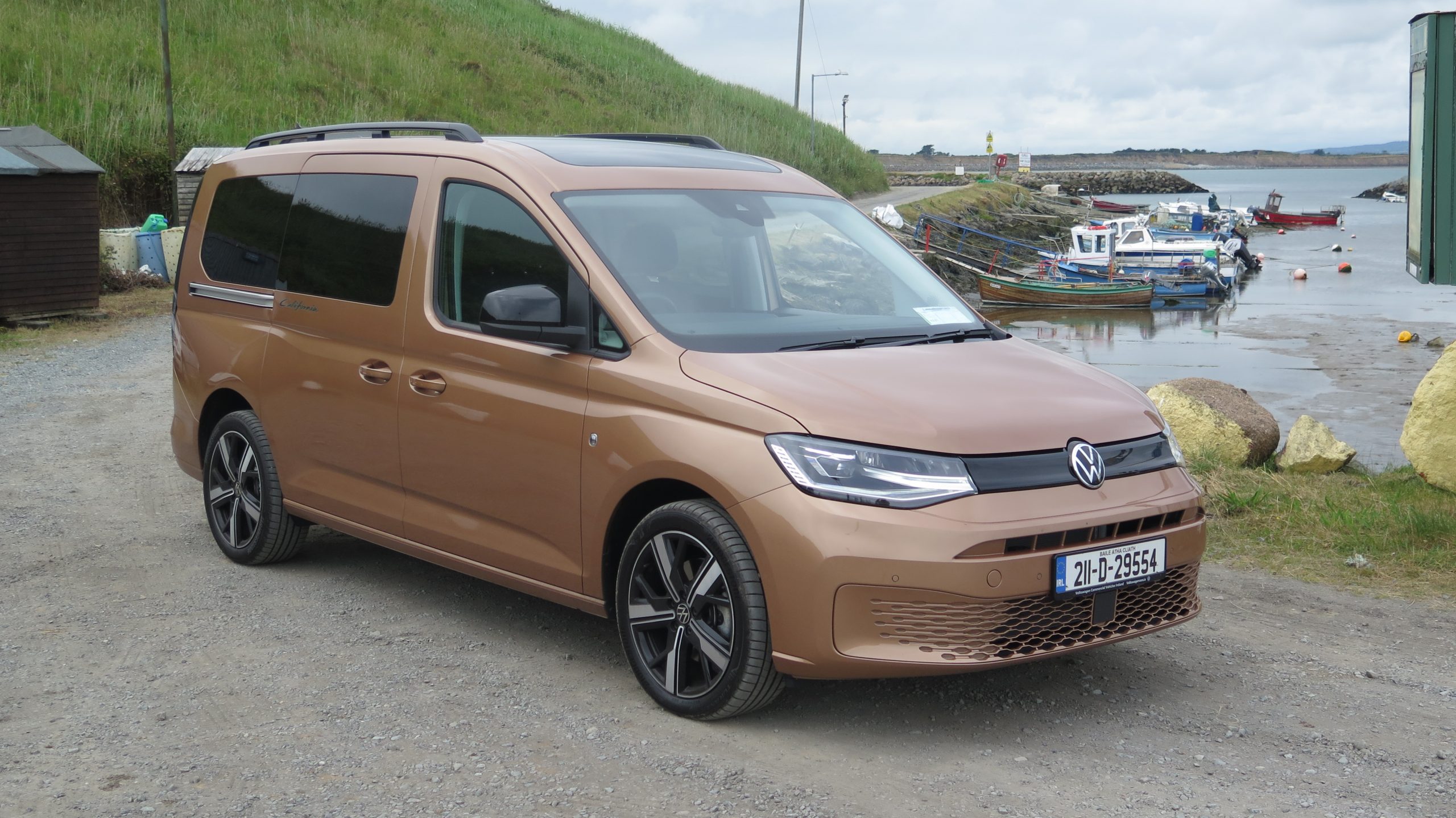 2021 VW Caddy California is a small camper with bed, pull-out kitchen